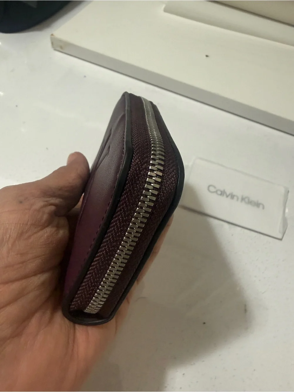 Calvin Klein Burgundy Zipper wallet with Embossed CK brand new